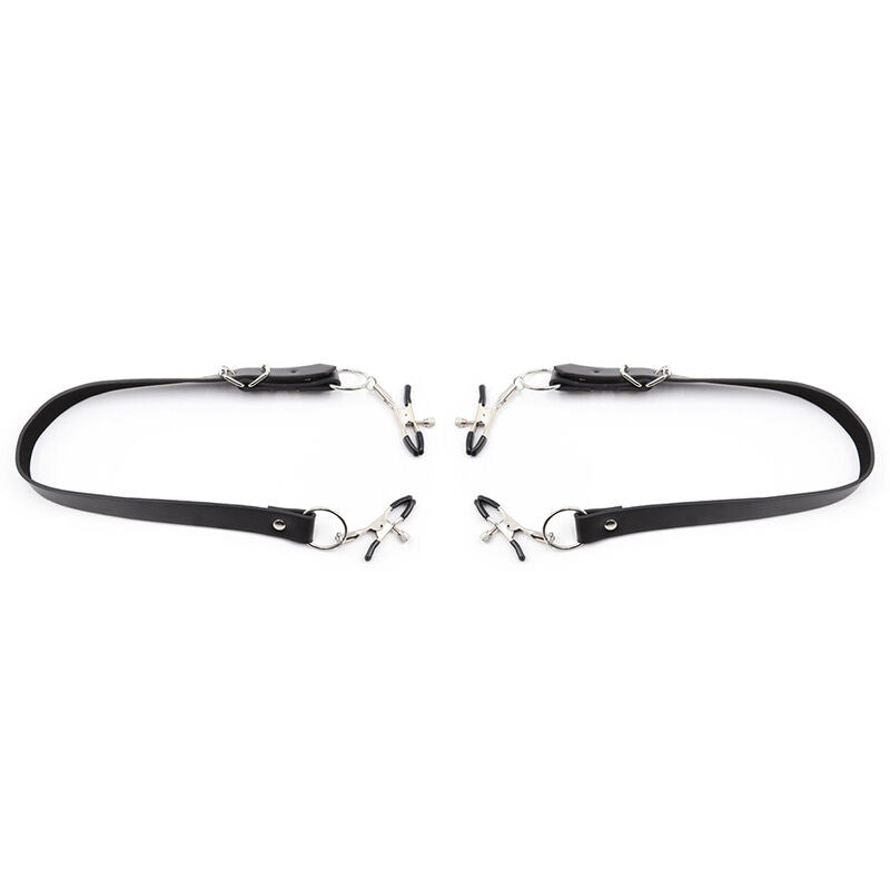 Klitoriksen nipistimet jalkahihnoilla kuva sivusta.